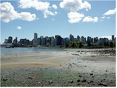 [ skyline of vancouver at very low tide ]